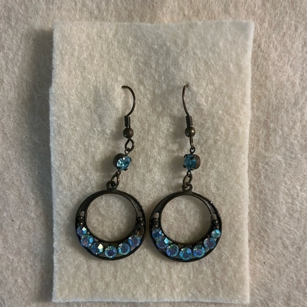 Dangling earrings, 2-1/2” long, blue rhinestones. NWOT.